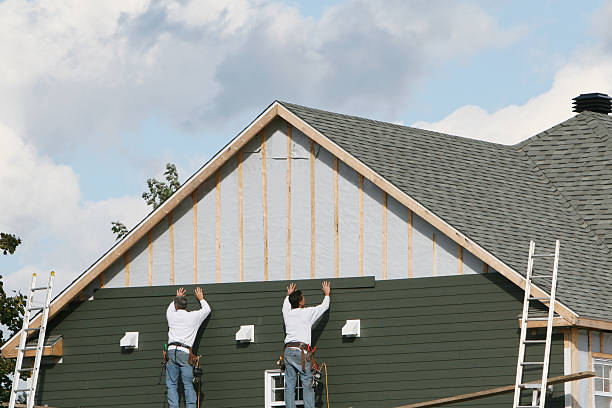 Professional Siding technician working in Lowell, IN